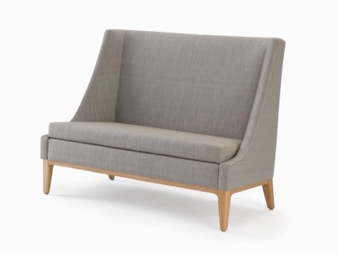 Nemschoff Iris Settee in a gray upholstery and light wood base and legs, viewed from the front. Nemschoff Iris Settee in a gray upholstery and light wood base and legs, viewed from the front.