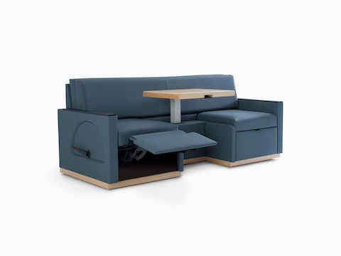 Nemschoff Merge 2 Flop Sofa in dark blue textile with light wood table and black solid surface arm caps.
