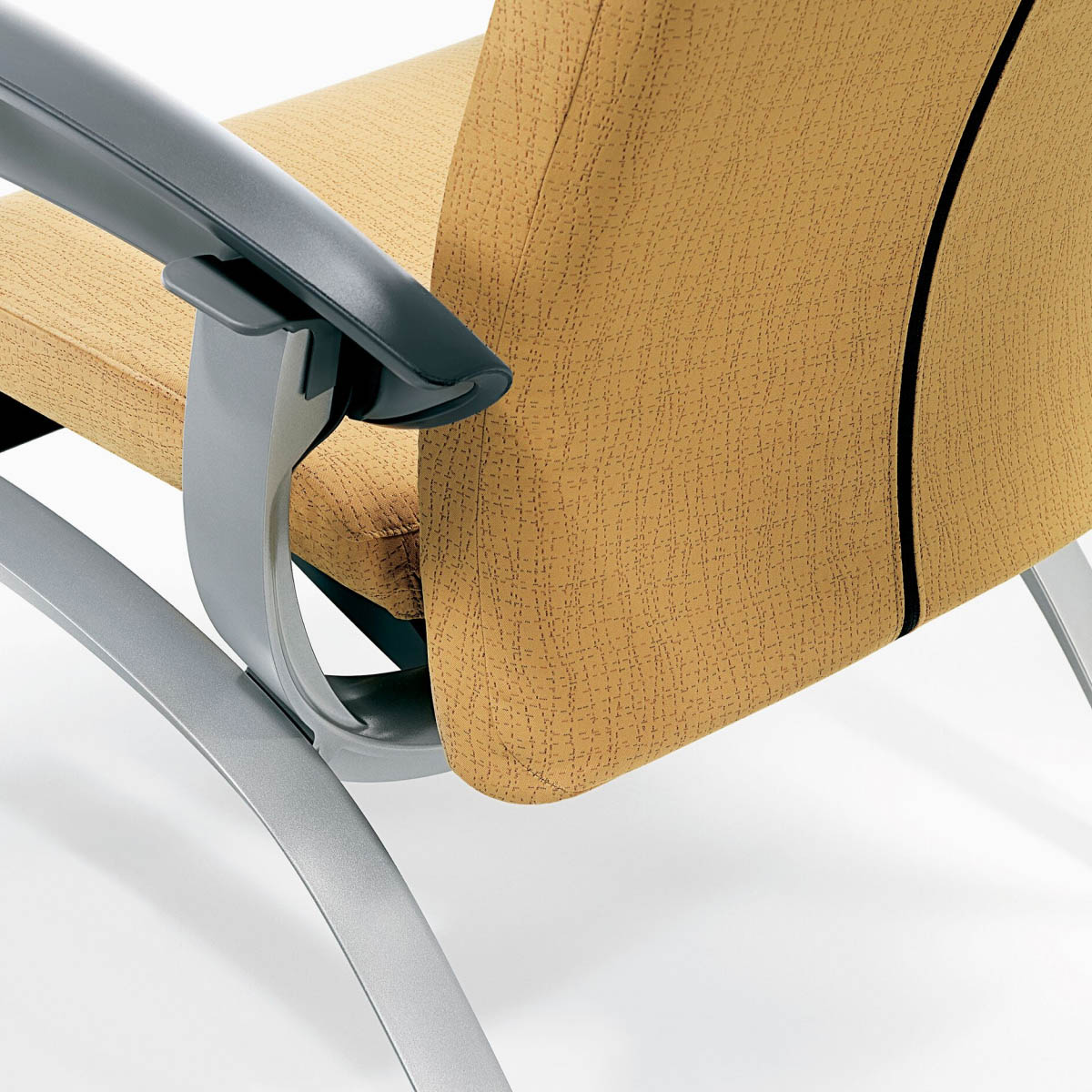 Detail of the back of a Nemschoff Nala Patient Chair showing the back and seat suspension.