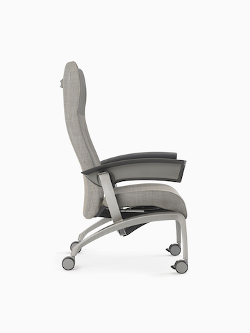Nemschoff Nala Patient Chair in a gray upholstery and dark gray arms on white sweep from the side.