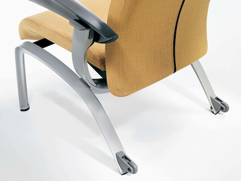Detail of the back of a Nemschoff Nala Patient Chair showing the rear casters.