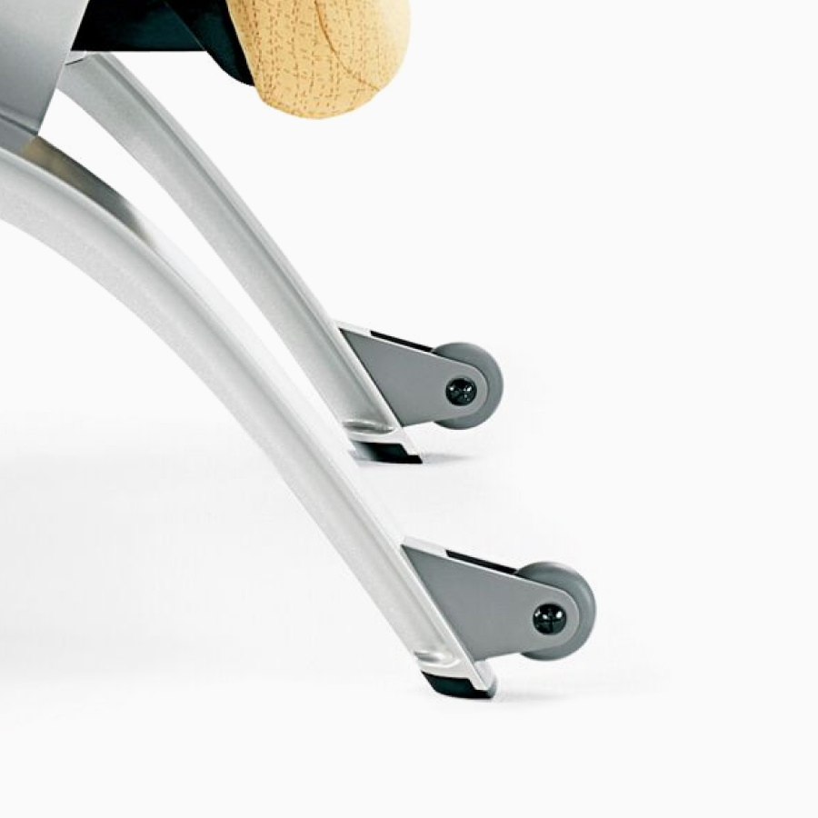 Detail of the rear casters on a Nemschoff Nala Patient Chair.