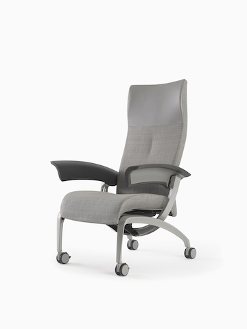 A Nemschoff Nala Patient Chair in gray textile with dark gray urethane arm pads. Select to go to the Nemschoff Nala Patient Chair product page.