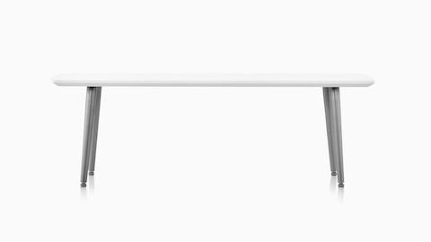 Palisade Coffee Table with metal legs and white solid surface top.