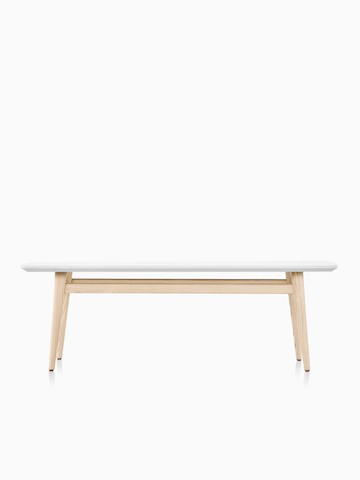 Palisade Coffee Table with white solid surface and wood legs.