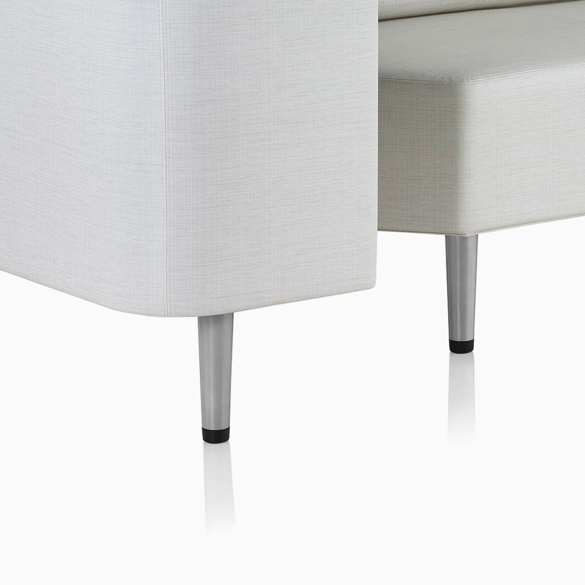 Detail of the glides on the legs of a Nemschoff Palisade Flop Sofa.