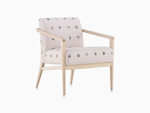 Three-quarter view of Palisade Lounge Chair in neutral patterned fabric with wood frame.