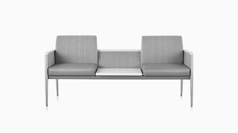 Front view of Nemschoff Palisade Multiple Seating with two seats and a center height-adjustable table surface in the down position.