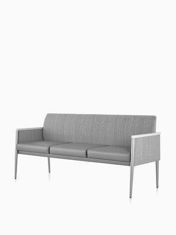 Front three-quarter view of Nemschoff Palisade Multiple Seating in a gray upholstery on white sweep. Select to go to the Nemschoff Palisade Multiple Seating product page.