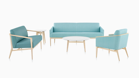 A turquoise Palisade Sofa with other Palisade lounge seating and a coffee table.