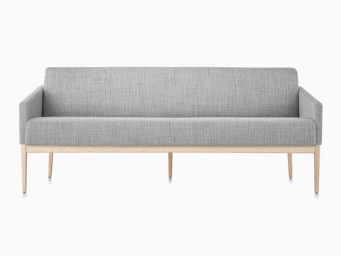 Palisade Sofa in gray fabric with wood legs.