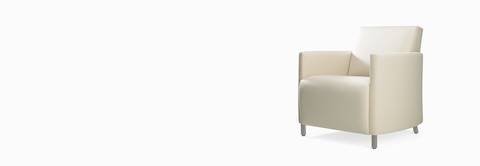 A three-quarter view of a Pamona Armchair in a white upholstery.