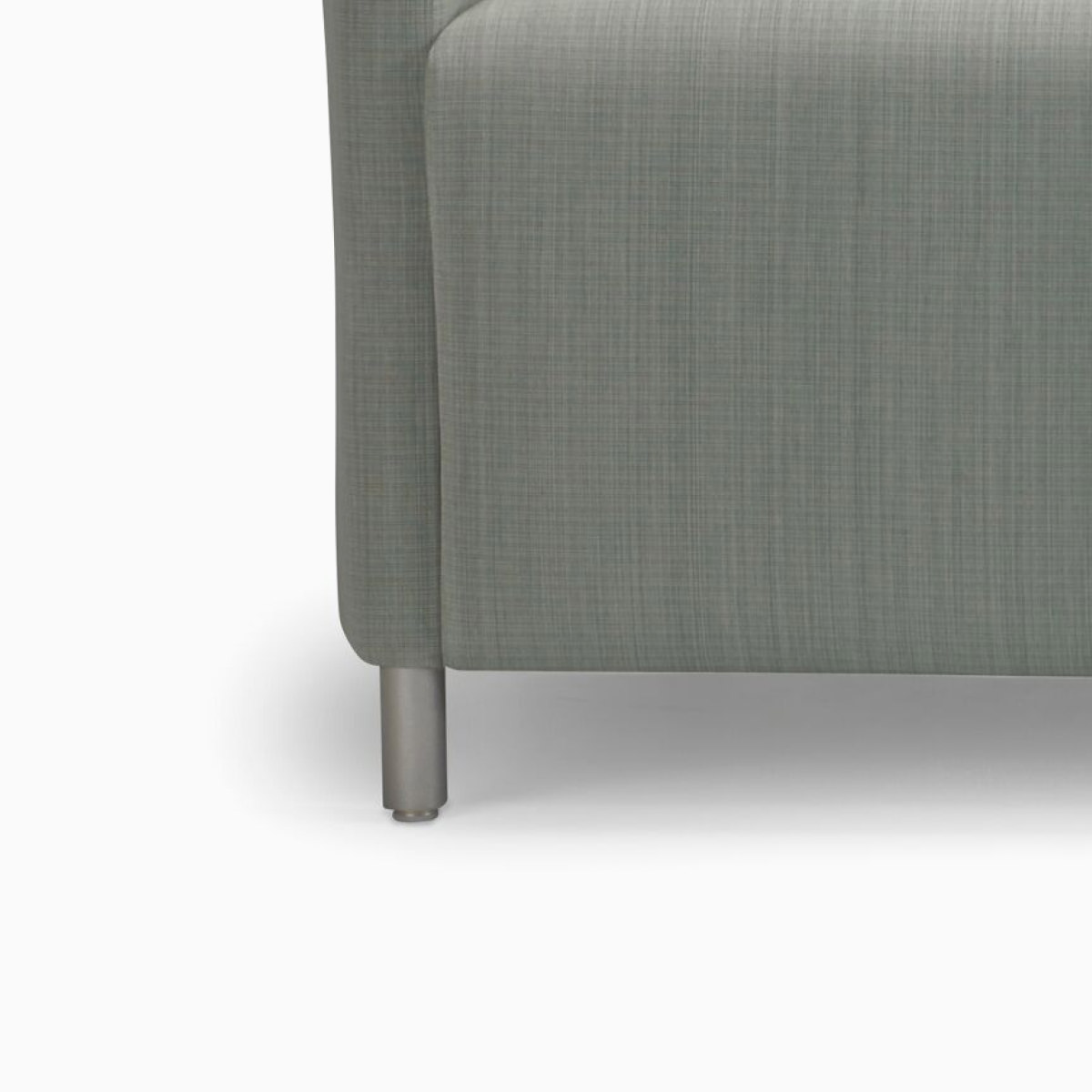 A Nemschoff Pamona Flop Sofa in gray textile with metal legs.