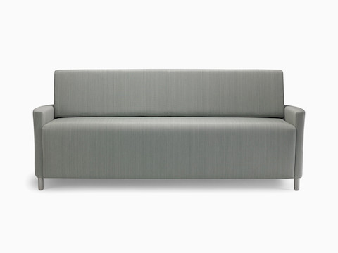 A Nemschoff Pamona Flop Sofa in a gray textile with metal legs.