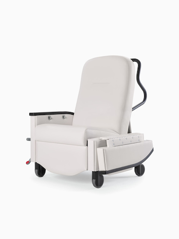 Nemschoff Pristo Recliner in a white upholstery with black arm caps and wheels with a fold-down arm.