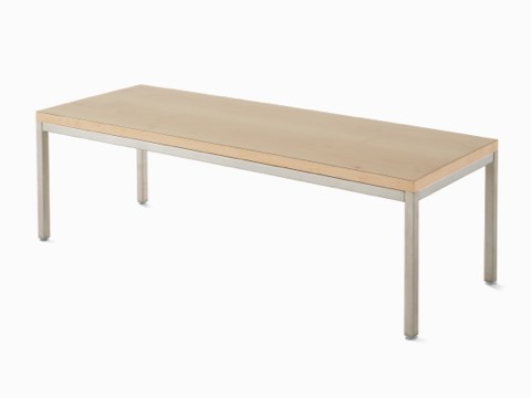 Angled view of Riva Coffee Table with a natural maple top and metallic silver base.