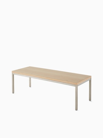 Angled view of Riva Coffee Table with a natural maple top and metallic silver base.