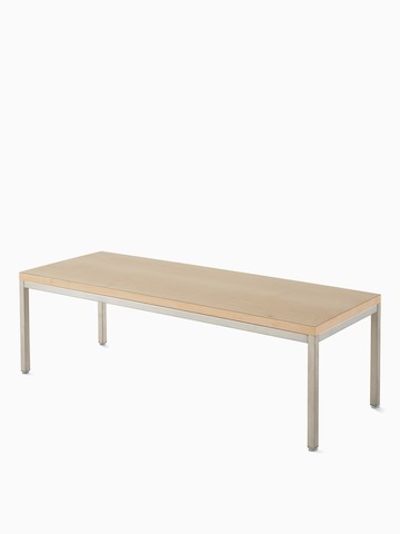 Angled view of Riva Coffee Table with a natural maple top and metallic silver base. Select to go to the Nemschoff Riva Coffee Table product page.