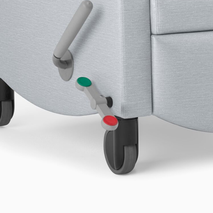 Close-up of the central brake and steer system on Nemschoff Sahara Recliner.