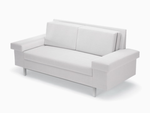 Nemschoff SleepOver Flop Sofa in white upholstery, viewed at an angle.