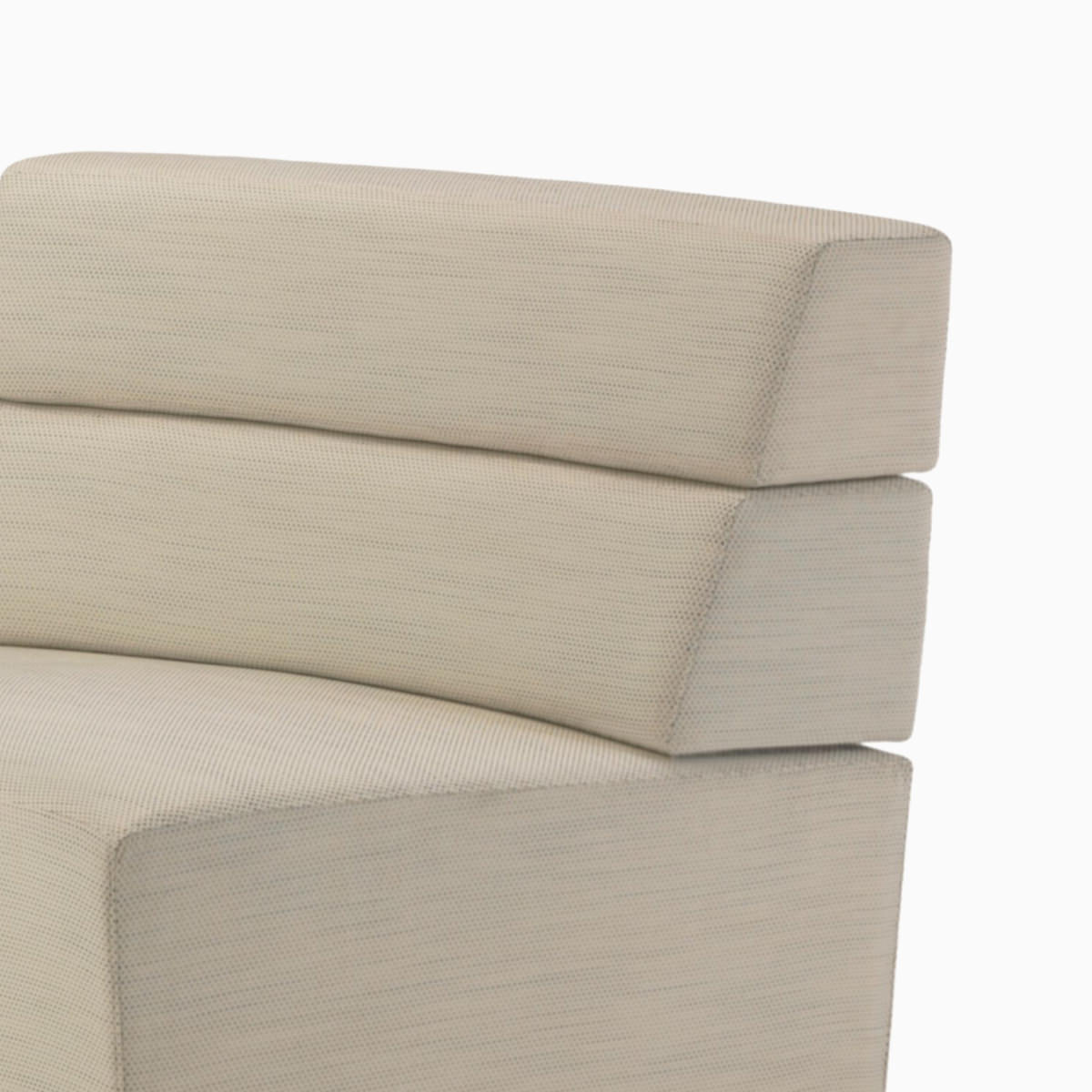 A mid-back inside wedge portion of a Nemschoff Steps Lounge System in a light-colored textile.
