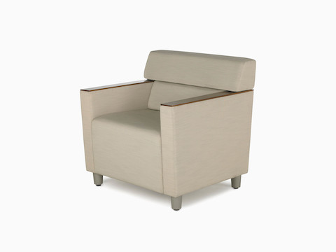 A low-back Nemschoff Steps Lounge System straight seat with arms in a light-colored textile.