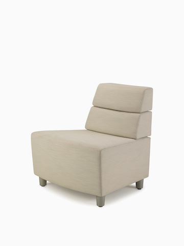 A mid-back outside wedge Nemschoff Steps Lounge System in a light-colored textile.