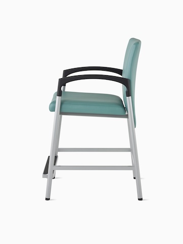 Side view of a Valor Easy Access Chair in a blue-green upholstery with a silver frame and black armcaps.