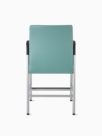 Back view of a Valor Easy Access Chair in a blue-green upholstery with a silver frame and black armcaps.