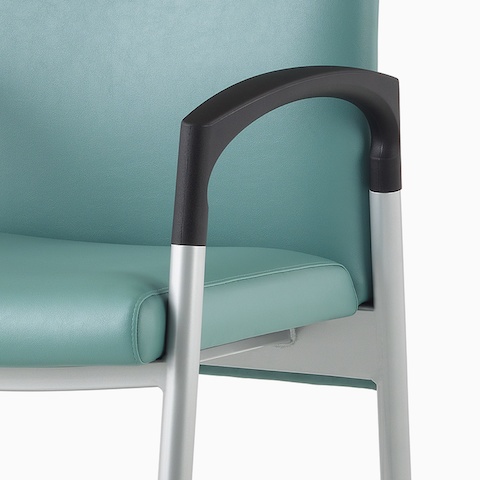 A close-up view of a Valor Easy Access Chair frame and contoured armcap.