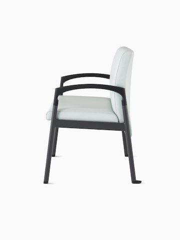 Side view of a Valor Plus Chair in a light gray upholstery and black frame.