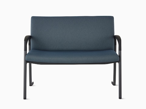 Front view of a Valor Plus Chair in a dark blue upholstery, black frame and armcaps.