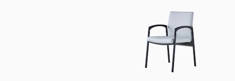 Three-quarter, left view of Valor Side Chair in a light gray upholstery on the back and seat and a black metal frame.