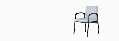 Three-quarter, left view of Valor Side Chair in a light gray upholstery on the back and seat and a black metal frame. Three-quarter, left view of Valor Side Chair in a light gray upholstery on the back and seat and a black metal frame.