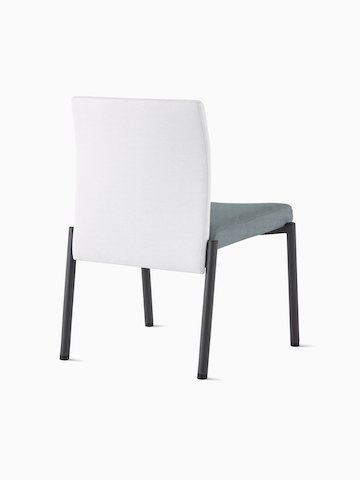 Three-quarter, back view of a Valor Stacking Chair without arms in a white back upholstery and a blue seat upholstery, and black frame.