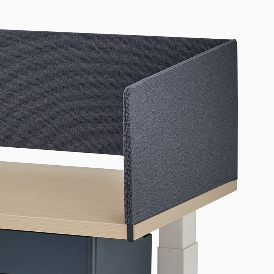 A close-up view of Nevi Link standing desk system's gray trough-mounted screen.