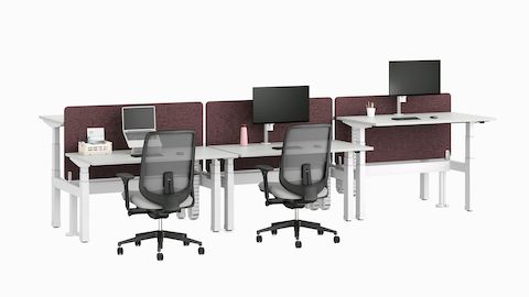 Nevi Link Sit-Stand bench with light grey work surfaces, maroon-coloured fabric screens, CBS work tools and Verus Chairs.