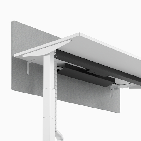 A close-up view of the under structure of a Nevi Sit-Stand Desk.