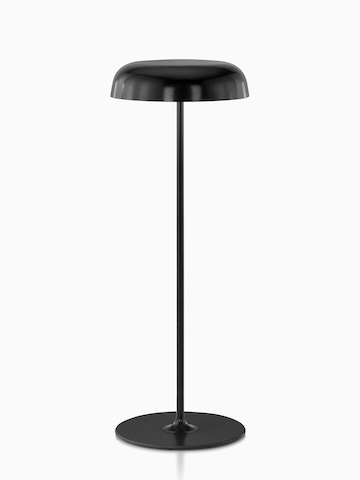 A black Ode sofa lamp.