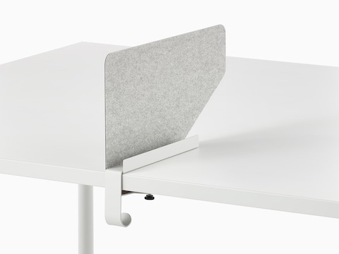 Grey OE1 Boundary Screen with liner on a white OE1 Rectangular Table, viewed from an angle.