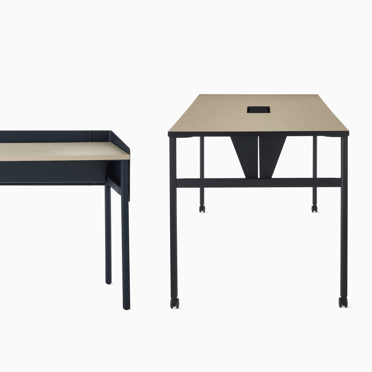 A black double sided OE1 Communal Table with a brown surface and casters with a dark blue single sided OE1 Communal Table with light brown surface and glides.