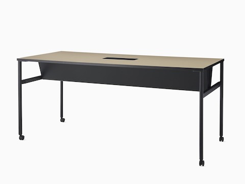 A double sided OE1 Communal Table with black finish, and light brown surface viewed from an angle.