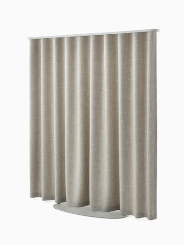 Light brown OE1 Freestanding Curtain with grey frame viewed from a front angle.