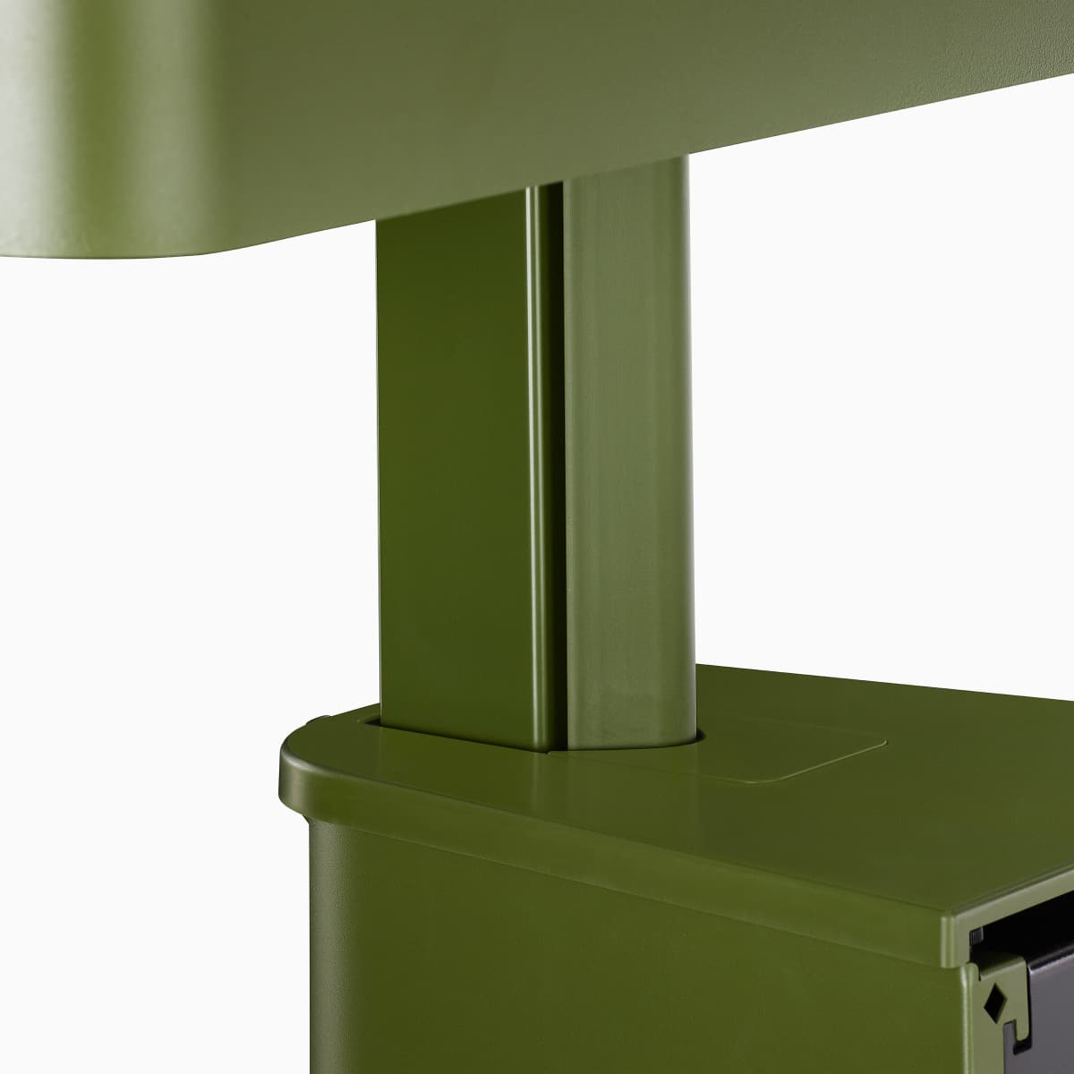 Close up image of a green, single OE1 Micro Pack base, viewed from a rear angle.