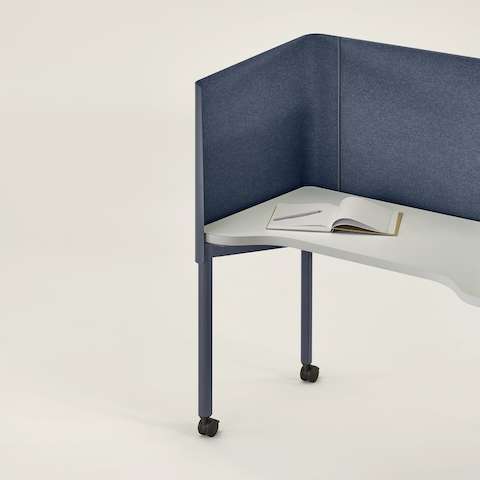 Blue OE1 Nook with white surface and casters. Blue OE1 Nook with white surface and casters.