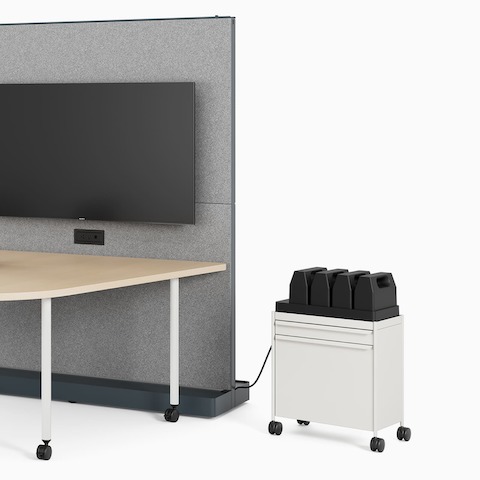 Grey OE1 Agile Wall, brown OE1 Huddle Table, white OE1 Storage Trolley and OE1 Power Pack and Power Tray, with a white background.