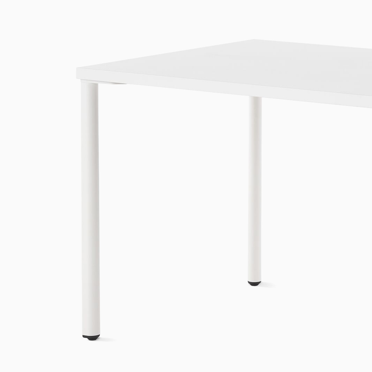 OE1 Rectangular Table with white surface and white legs viewed from an angle.