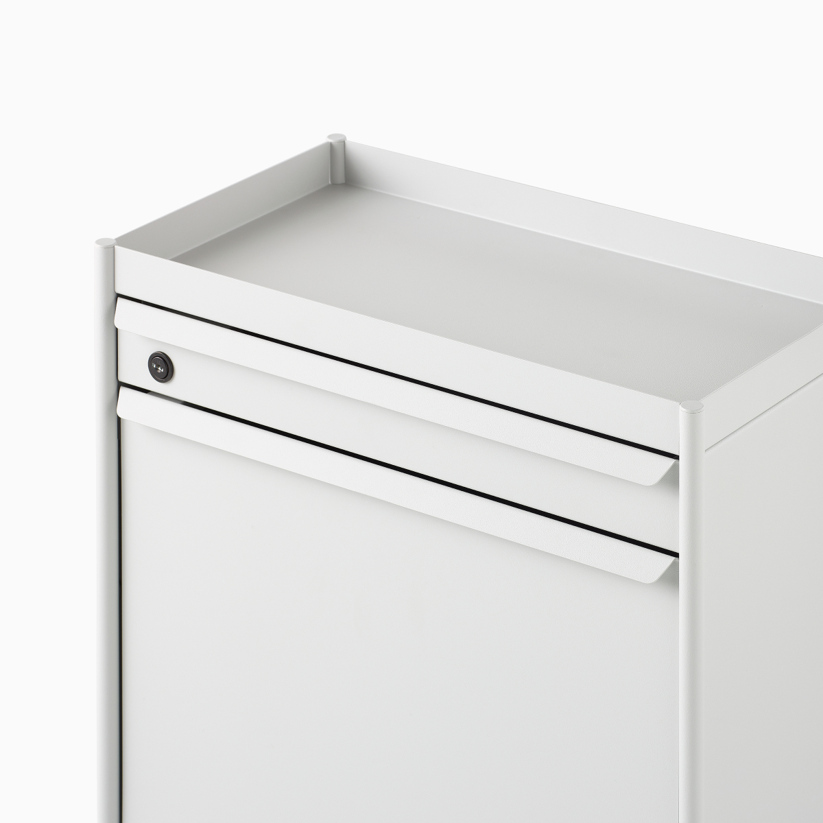 Close up image of a white individual OE1 Storage Trolley with drawer and tip-out bin, viewed from a front angle.