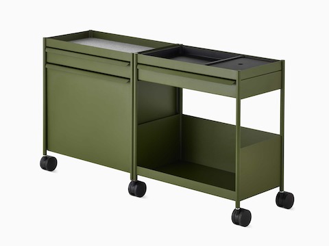 Carrito de almacenamiento OE1 en verde, con cajones, gaveta de punta saliente y estante, visto desde un ángulo.