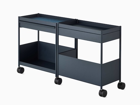 A blue shared OE1 Storage Trolley with casters, viewed from an angle.